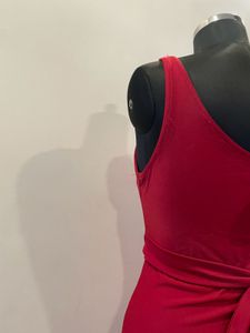 Red one shoulder slit dress