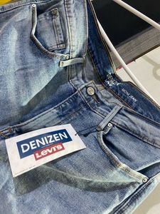 Levi’s distressed mom fit jeans