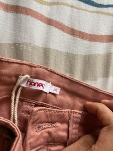 skinny jeans peach coloured. only used twice