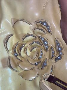 Floral pearl embellished purse