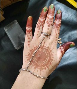 Hand Bracelet With Attached Ring