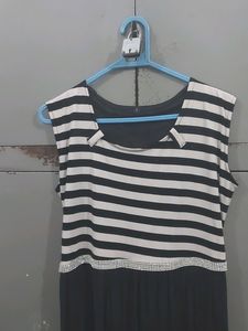 Only wore it a few times. Can wear as long gown or midi