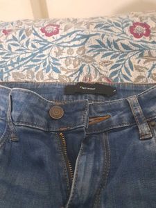 Distressed Bootcut Jeans