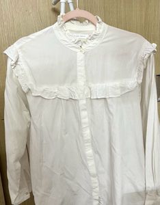 Elegant White Ruffle Blouse with High Neck Detail