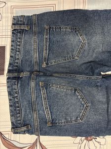 Ripped Blue Denim Jeans