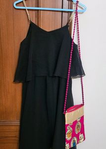 Black dress with sling bag