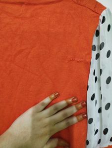 Orange Top with Polka Dot Sleeves