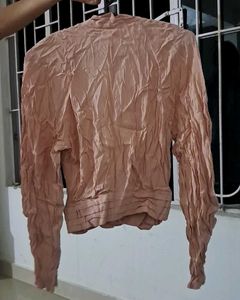 wrap style light pink blouse