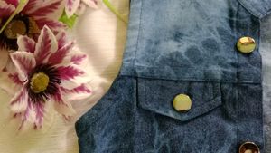 Sleeveless denim overcoat