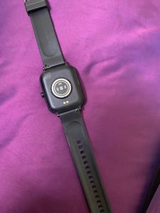 Sleek Black Smartwatch With Charger
