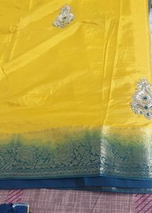 Elegent Yellow Saree With Tale Green Blouse