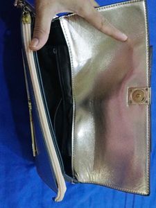 Metallic Bow Clutch