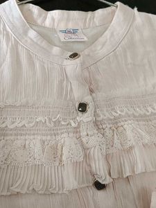 This Is A Flared Dress With Lily Print On It