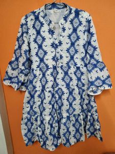 White Knee-Length One-Piece with Blue Embroidery