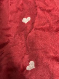 red joggers with white hearts