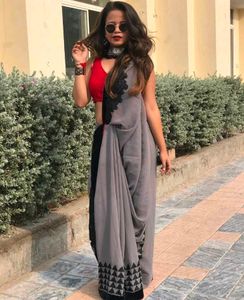 Grey &amp; Red Saree with Black Accents