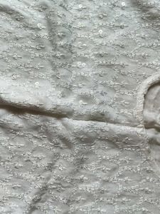 White kurta with little sequin work on it