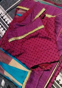 Saree In Multi Colour With Golden Lace.