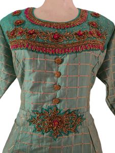 Elegant Green Dress with intricate embroidery
