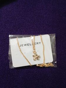 Puzzle Piece Pendant Necklace