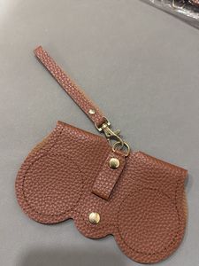 Sunglasses Cover Hanging On Handbag