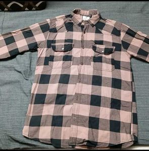 A Check Shirt With Black Or Peach Colour Combinati