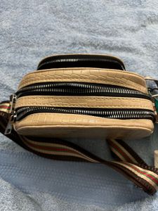 Caprese Medium Croc Textured Sling