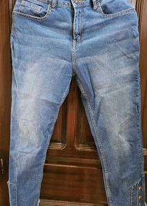 Women's Blue Jeans with Button Detail
