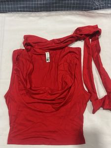 a red drape top