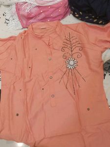 Peach Kurti and White Palazzo Pants