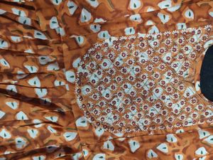 🆕 Naira Cut Orange Embroidered Kurti