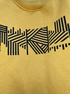 yellow pullover for men and women winter wear.
