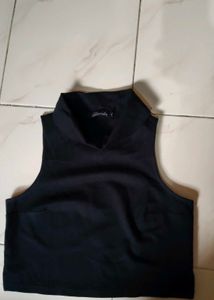 Black Sleeveless Turtleneck Top