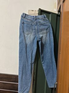 Ripped Knee Jeans