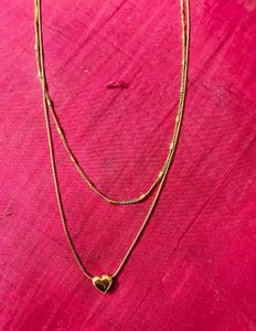 golden and silver pendent combo