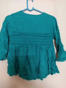 Turquoise Green Peplum Top With Pearl Design