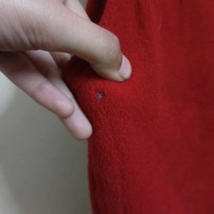 sleeveless red jacket