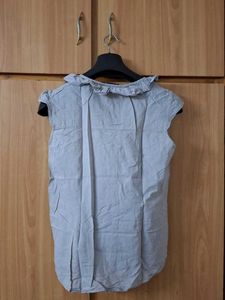 Ruffled Sleeveless Top