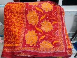 Elegant Orange Floral Cotton Saree