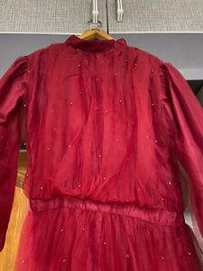 red net gown with pearls