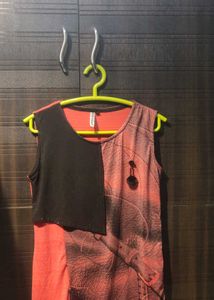pink and black sleeveless top