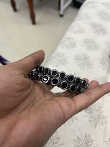Pair Of Bangles With A Hairclip