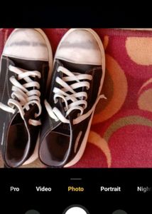 Black and white sneakers converse
