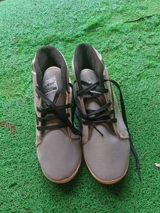 Man And Woman Sports Shoes