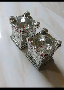 silver diya set of 2 brand new without tag .