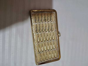Gold Color Ka Bag Hai Yah Party Wear Ha