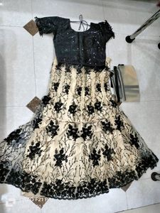 Black And Golden Lahenga With Heavy Work.