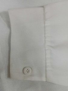 White Top with Black Tie