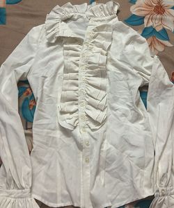 white ruffle shirt