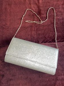 Sparkling Silver Clutch cum sling with chain👛